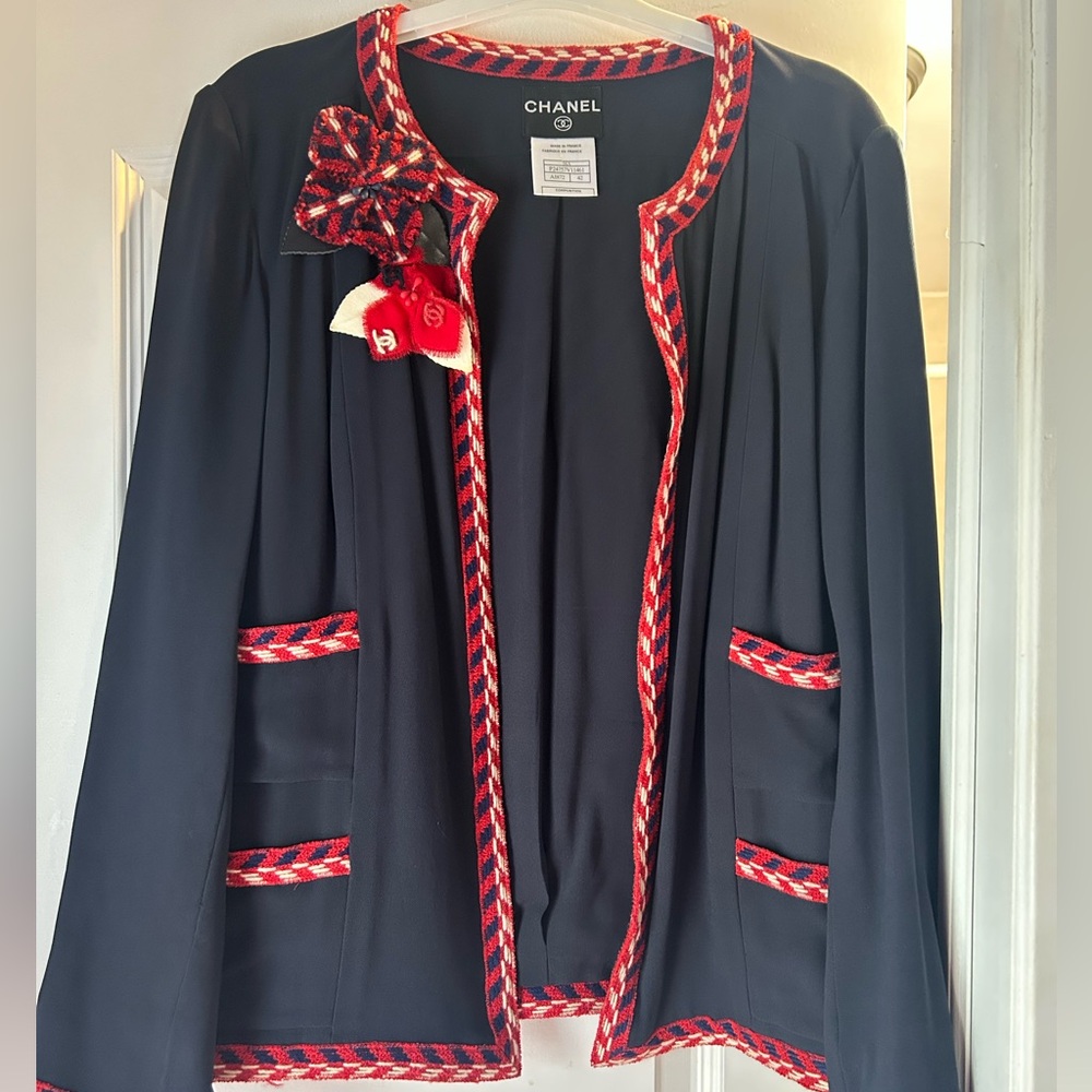 CHANEL Elegant Black Jacket with Red Accents